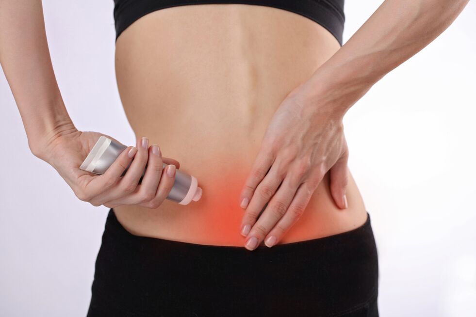 application of oil to the lower back for osteochondrosis